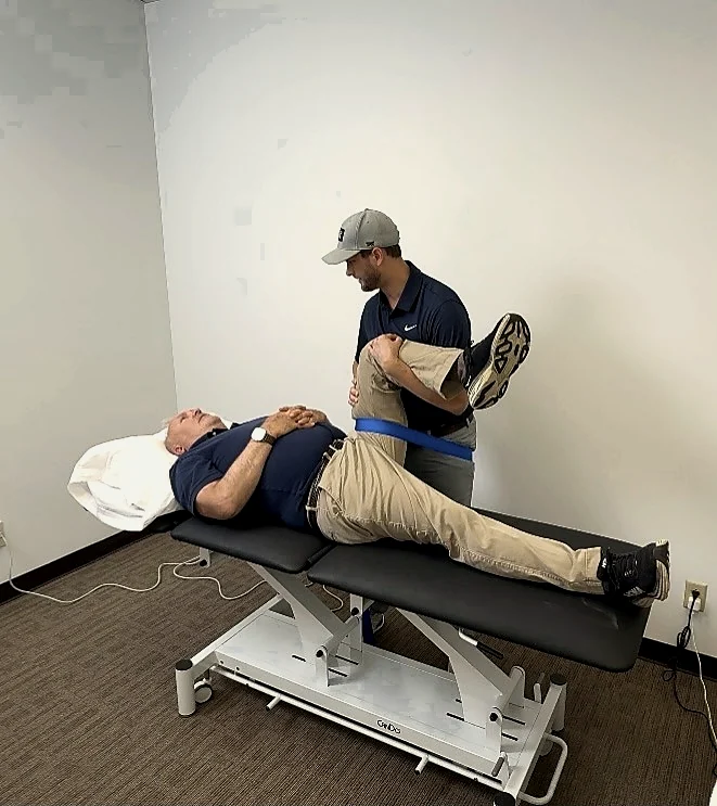One-on-one mobility work during physical therapy at Wampler Sports Performance.